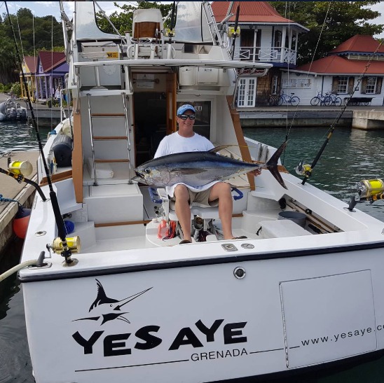 fisherman-holding-large-tuna-on-boat-grenada